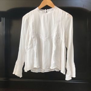Elegant white mock neck lace top